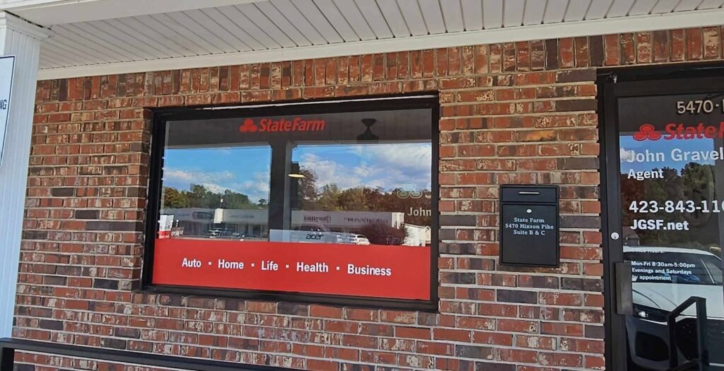Brick office on Hixson Pike in Hixson, TN with commercial window film on the front window