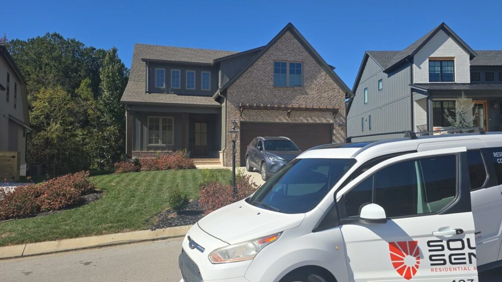 Jasper Highlands home where Solar Sentinel installed window film, with the Solar Sentinel van out front