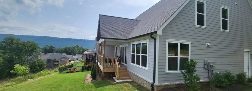 Gray craftsman home with a mountain view in Jasper, TN with residential window film by Solar Sentinel