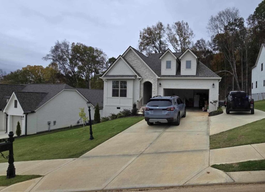 White brick new-construction home with residential window film by Solar Sentinel
