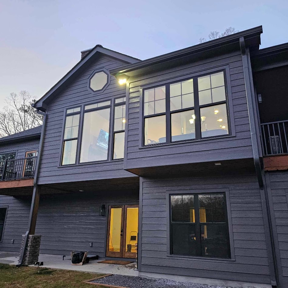 Hixson area home at dusk with window film, Solar Sentinel Window Tint